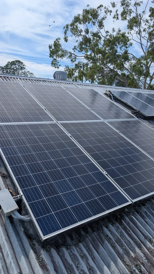 The same customer solar array after cleaning, with the panel glass visible